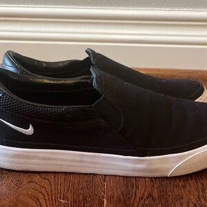 Nike Women's Black and White Slip-On Sneakers